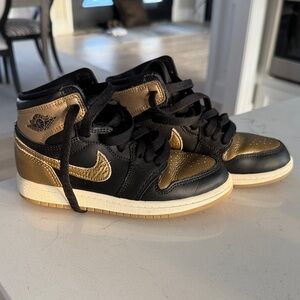 Nike Black and Gold Sneakers